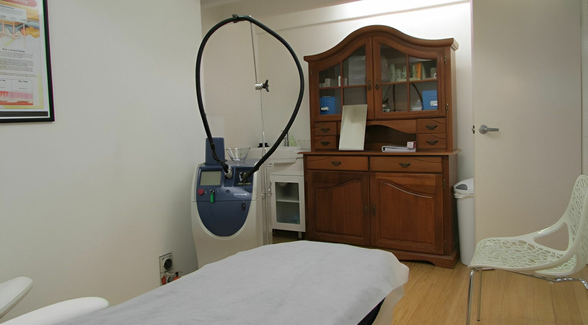 Modern laser treatment room at Helios Laser Studio, Melbourne, Victoria, AU showcasing advanced equipment.