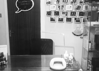 Nail care station at Infinite Beauty Within Hair Chair, Carluke, Scotland, showcasing products and tools.