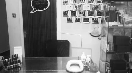 Nail care station at Infinite Beauty Within Hair Chair, Carluke, Scotland, showcasing products and tools.