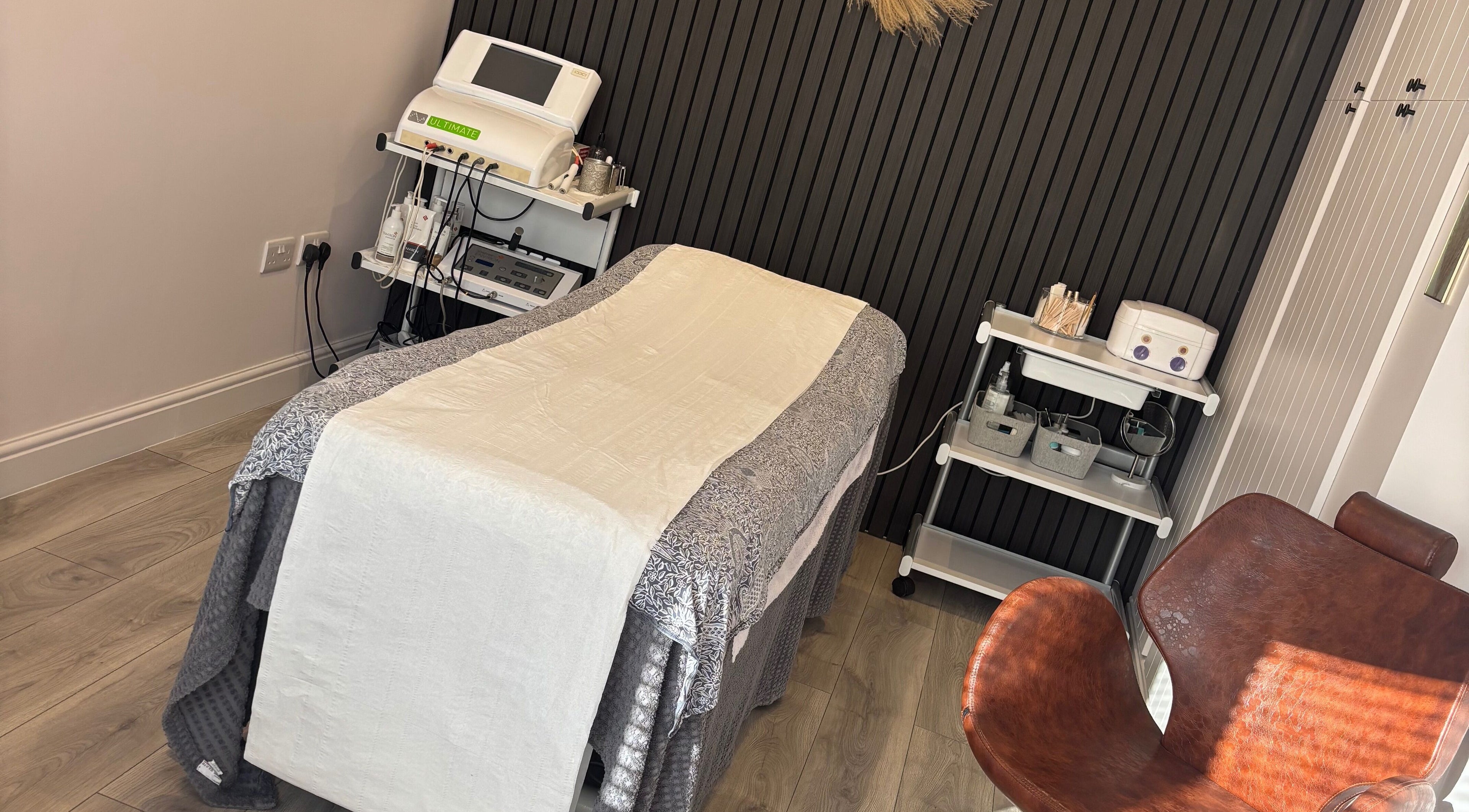 Treatment room at Beauty at The CowShed, Uttoxeter, England, GB with modern equipment and cozy ambiance.