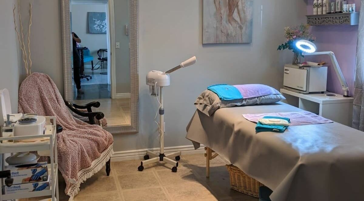 Cozy treatment room at Always Smooth Waxing Studio, Taylorsville, Utah, US, with a spa bed and calming decor.