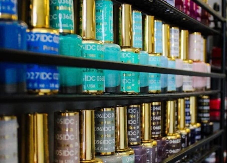 A colorful array of nail polish bottles at Studio J, Sandpoint, Idaho, US, showcasing vibrant shades.