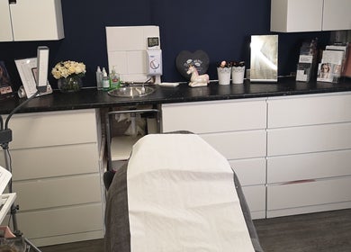 Sophisticated beauty treatment room at Diva's - The Home of Beauty, Doncaster, England, GB featuring sleek decor.