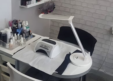 Nail treatment station at Diva's - The Home of Beauty, Doncaster, England, GB, showcasing manicure tools.