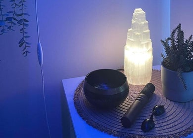 Elegant decor at Soulful Skin Studio, South Penrith, New South Wales, AU, featuring a glowing lamp and plant.