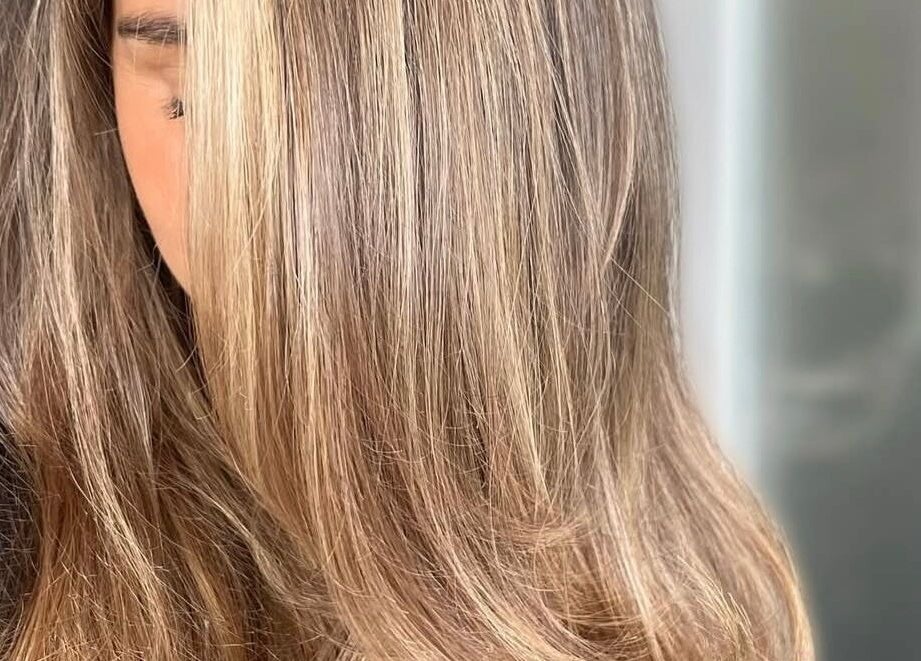 Shiny blonde hair at Image Beauty, Bearsden, Scotland, GB. Perfectly styled for a radiant look.