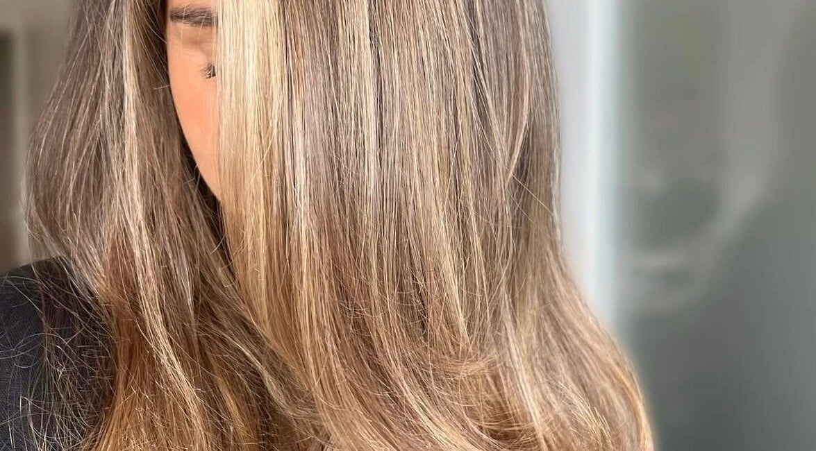 Shiny blonde hair at Image Beauty, Bearsden, Scotland, GB. Perfectly styled for a radiant look.