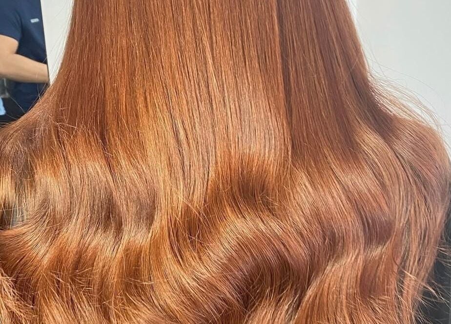 Stylish auburn hair styling at Image Beauty, Bearsden, Scotland, GB.
