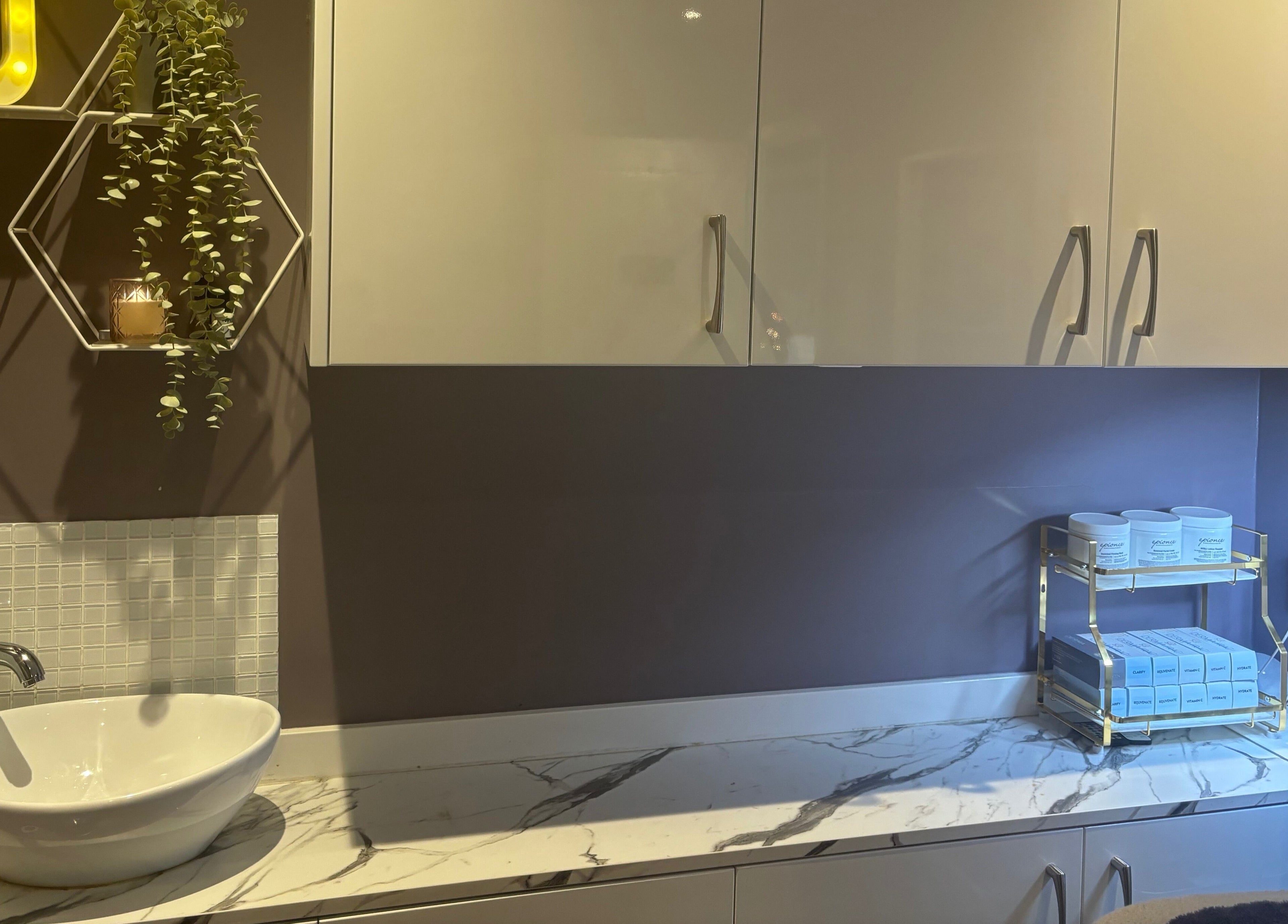 Chic skincare setup at Utopia Beauty and Skincare Belfast in Castlereagh, Northern Ireland, GB featuring a marble sink.