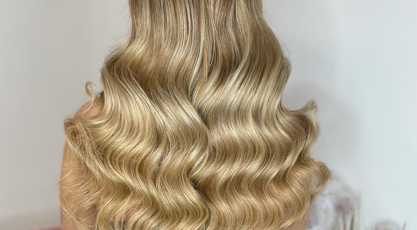 Blonde waves hairstyle at The Hair 411, Glasgow, Scotland, GB.
