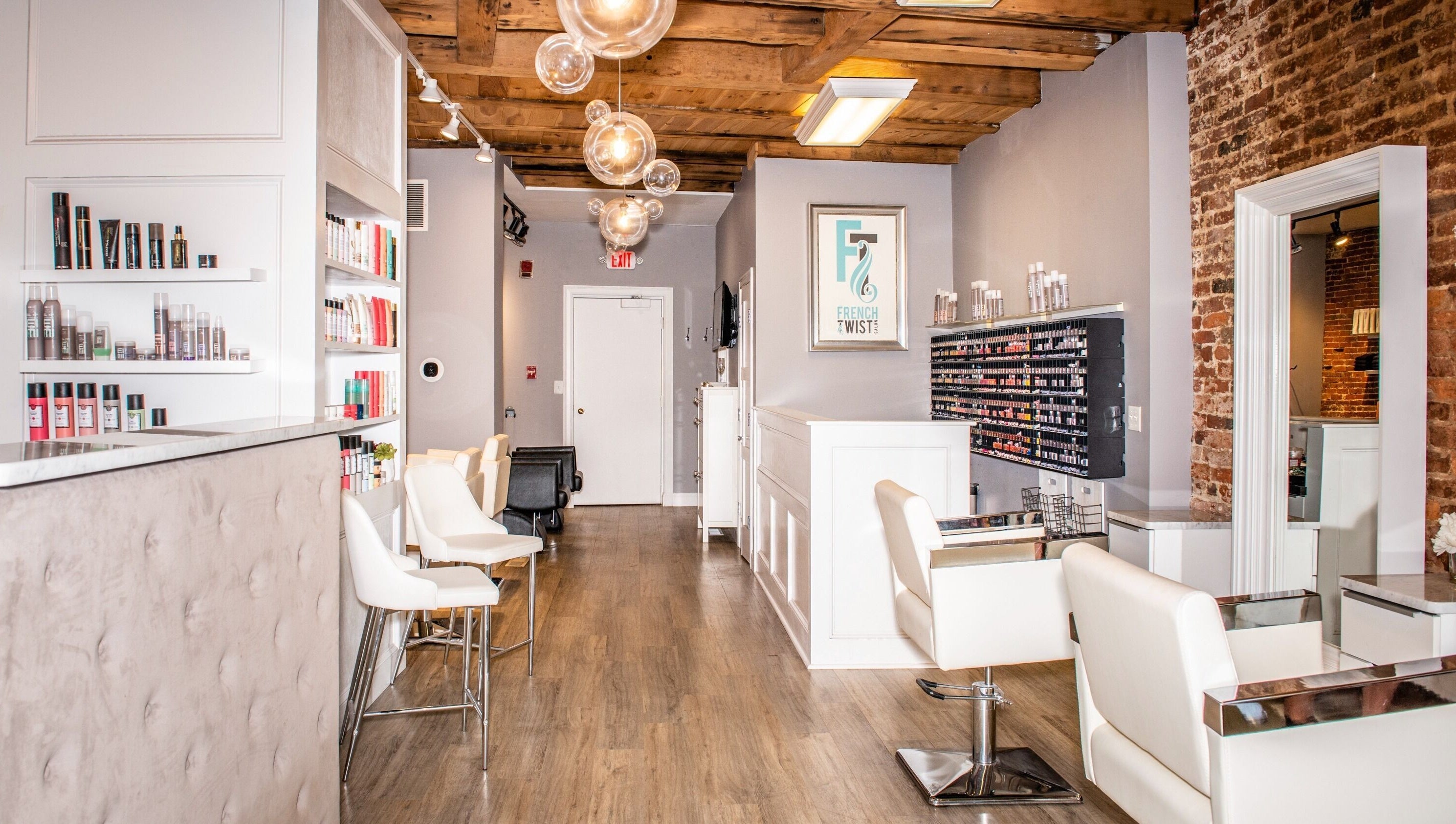 Interior of French Twist Salon, Newburyport, with elegant decor and styling stations.