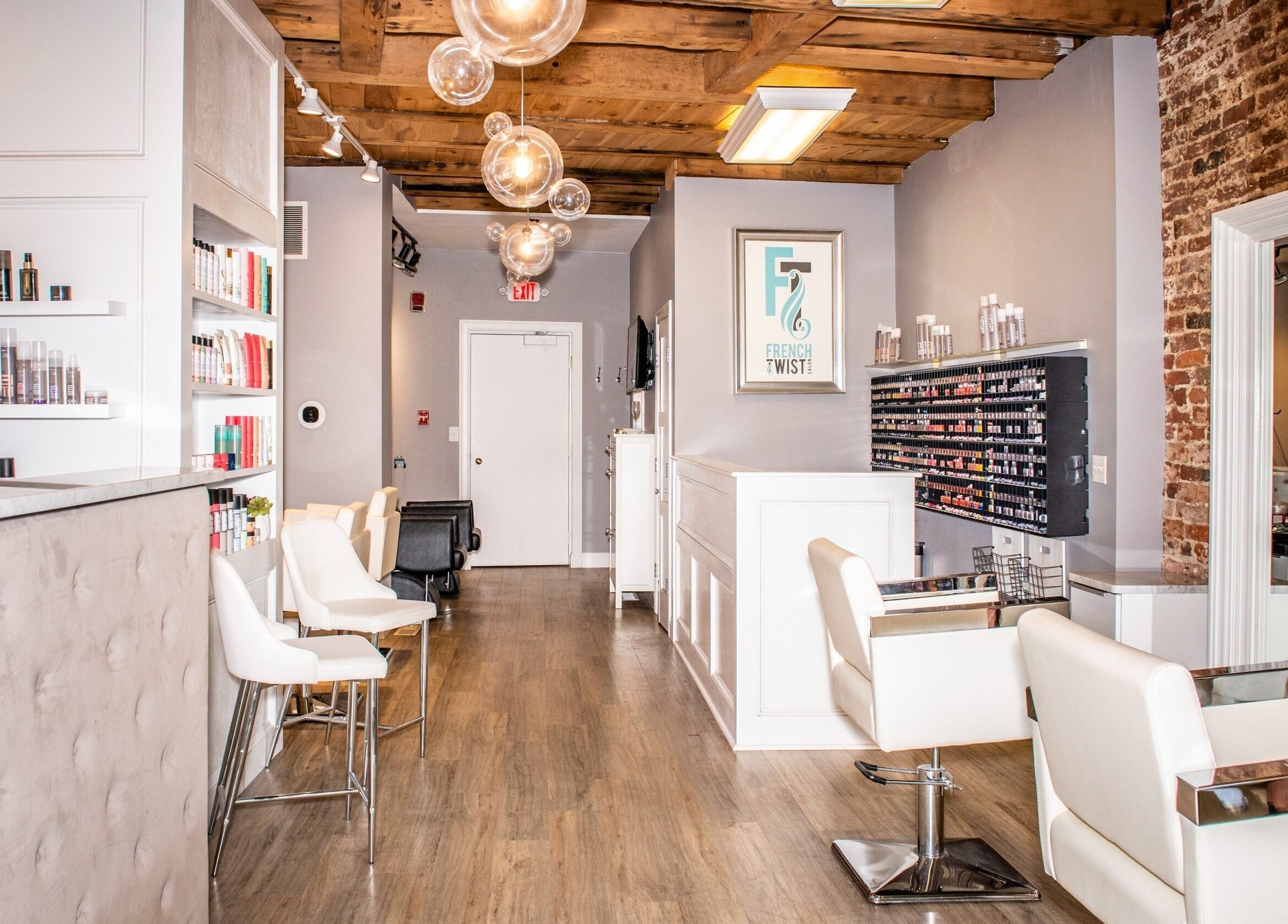 Interior of French Twist Salon, Newburyport, with elegant decor and styling stations.