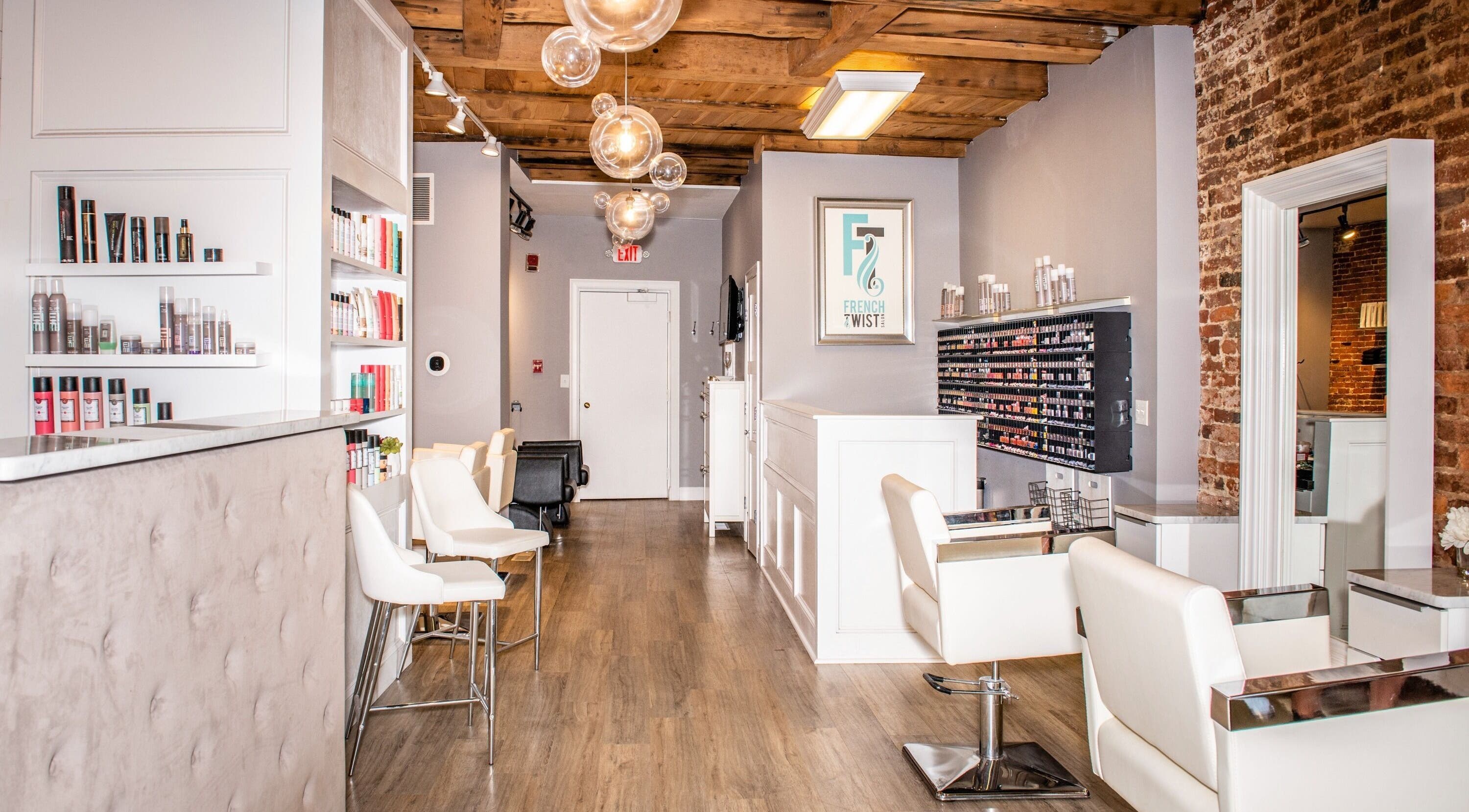 Interior of French Twist Salon, Newburyport, with elegant decor and styling stations.