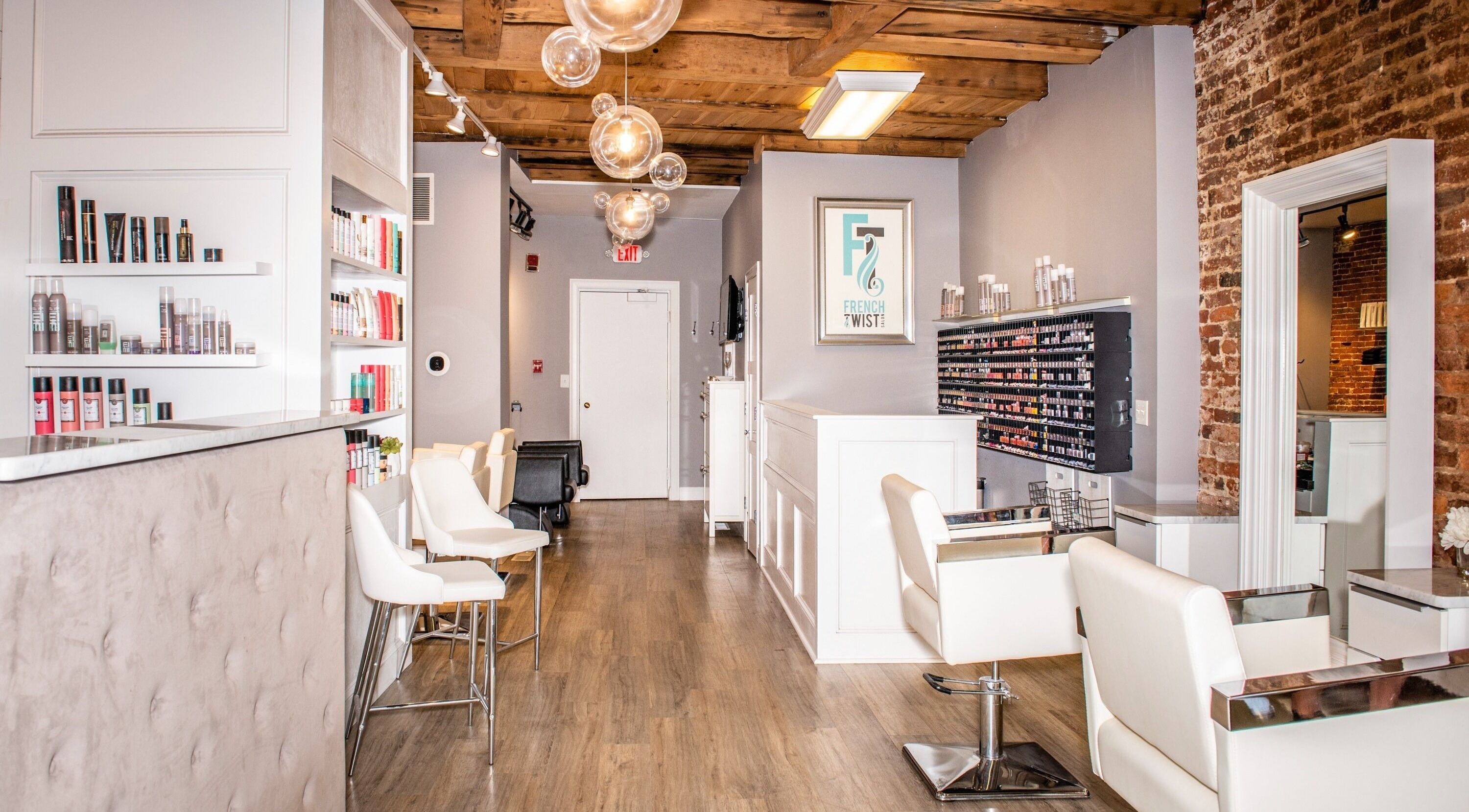 Interior of French Twist Salon, Newburyport, with elegant decor and styling stations.