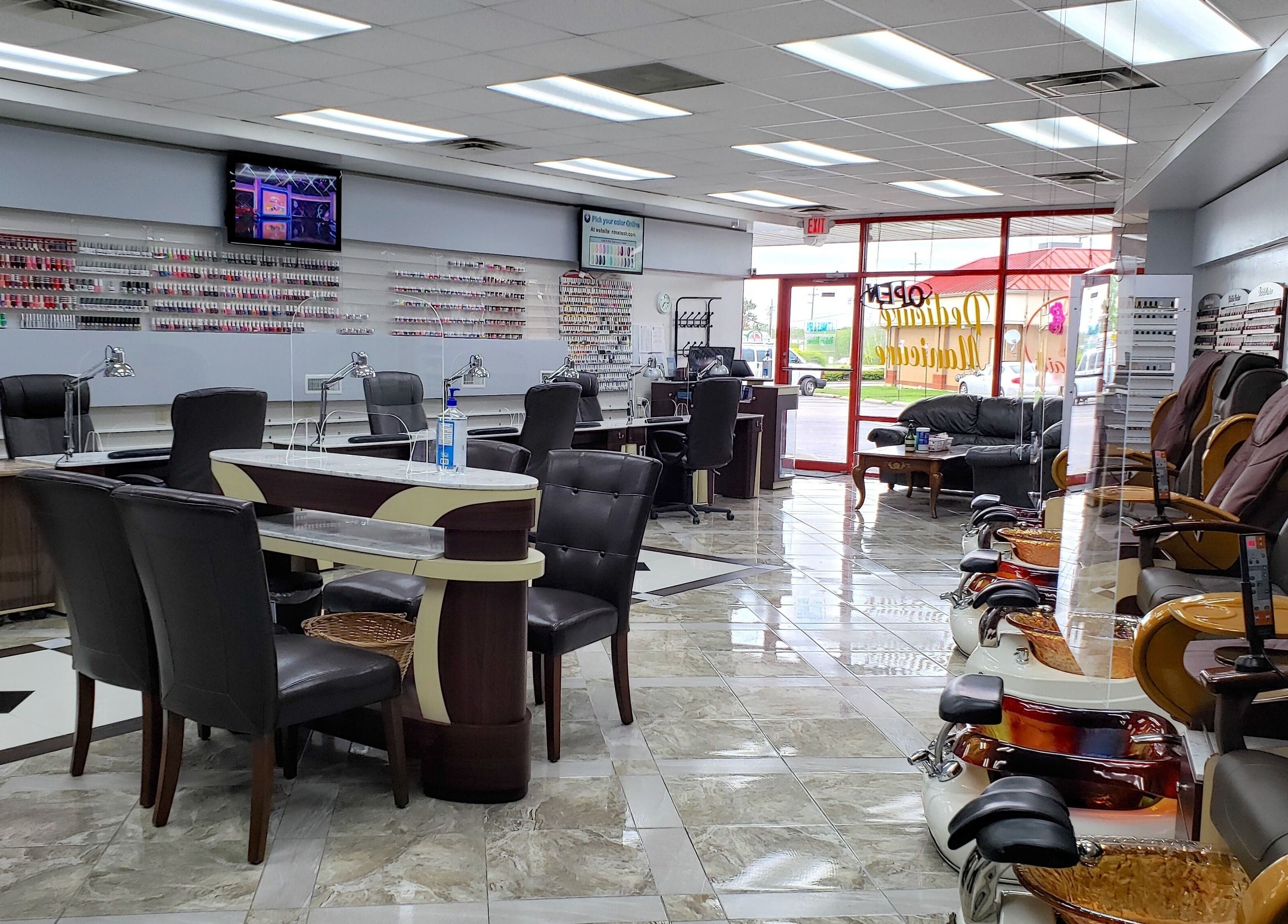 Inside NT Nails and Spa showcasing plush seating and nail stations in West Chester, Ohio, US.