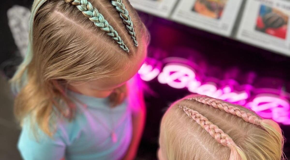 Colorful kids' braids at Sydney Braid Bar - Rouse Hill, Rouse Hill, New South Wales, AU, showcasing vibrant styles.