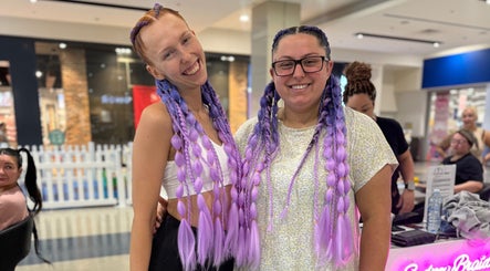 Smiling customers with vibrant braids at Syd Braid Bar - Eastgardens, Eastgardens, New South Wales, AU.