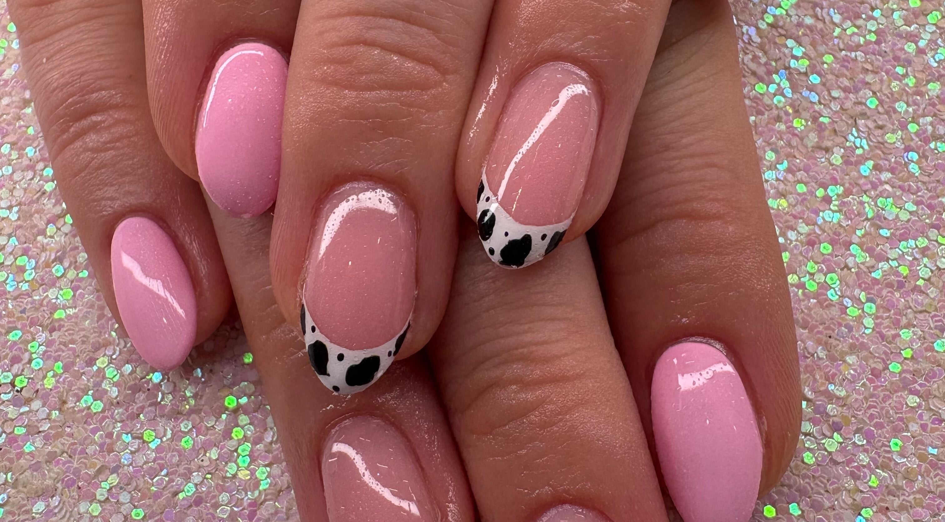 Elegant pink nails with cow pattern tips at Only Way Is Beauty, Long Melford, England, GB.