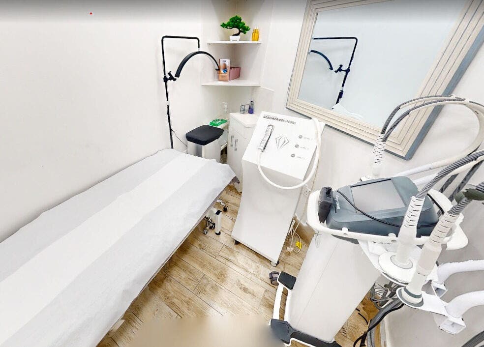 Serene treatment room at Nu Wave Laser Clinic in London, England, GB, featuring advanced cosmetic equipment.