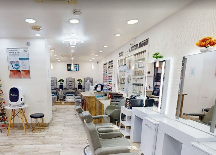 Inside Nu Wave Laser Clinic, London, England, GB, showcasing modern beauty and wellness equipment and stylish decor.