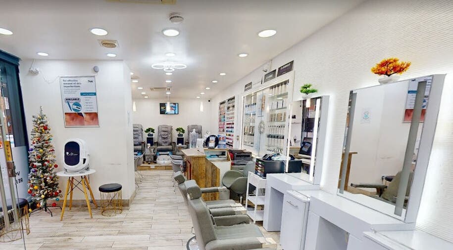 Inside Nu Wave Laser Clinic, London, England, GB, showcasing modern beauty and wellness equipment and stylish decor.