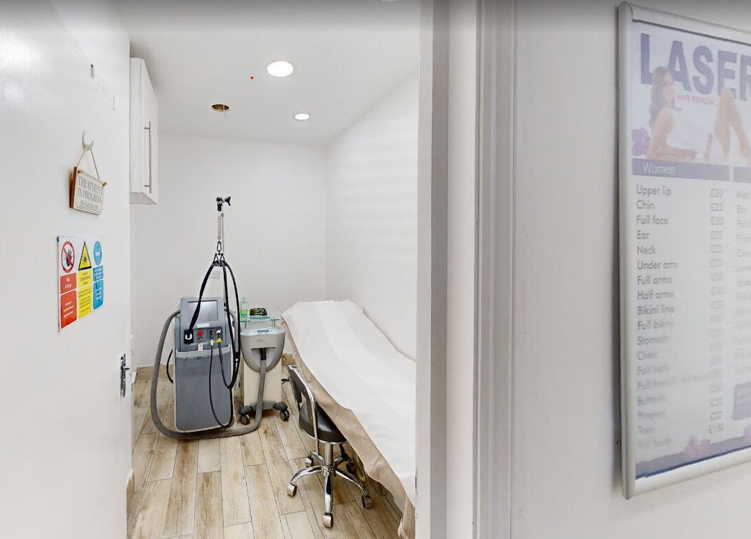 Laser treatment room at Nu Wave Laser Clinic in London, England, GB showcasing modern equipment and clean design.