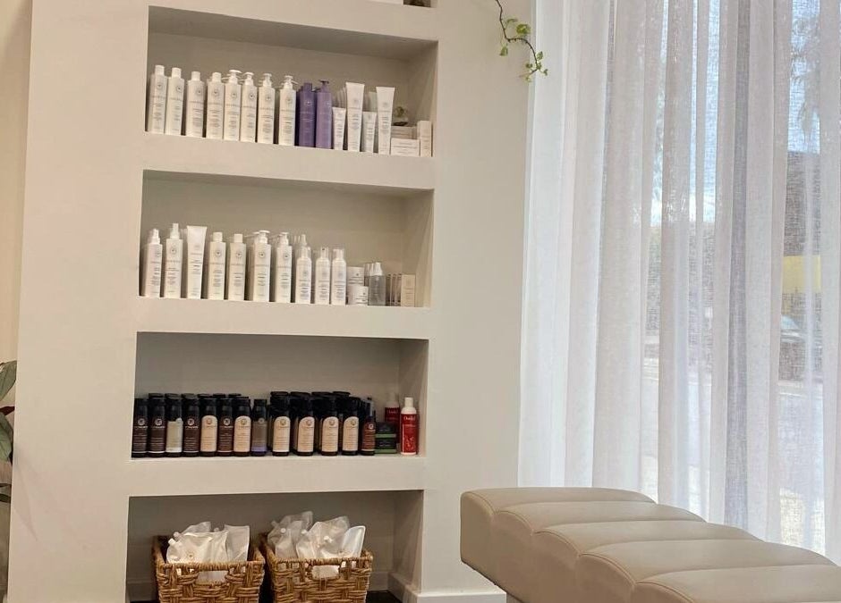 Product display at Perth Curls in Leederville, Western Australia, AU. White shelves with beauty products.