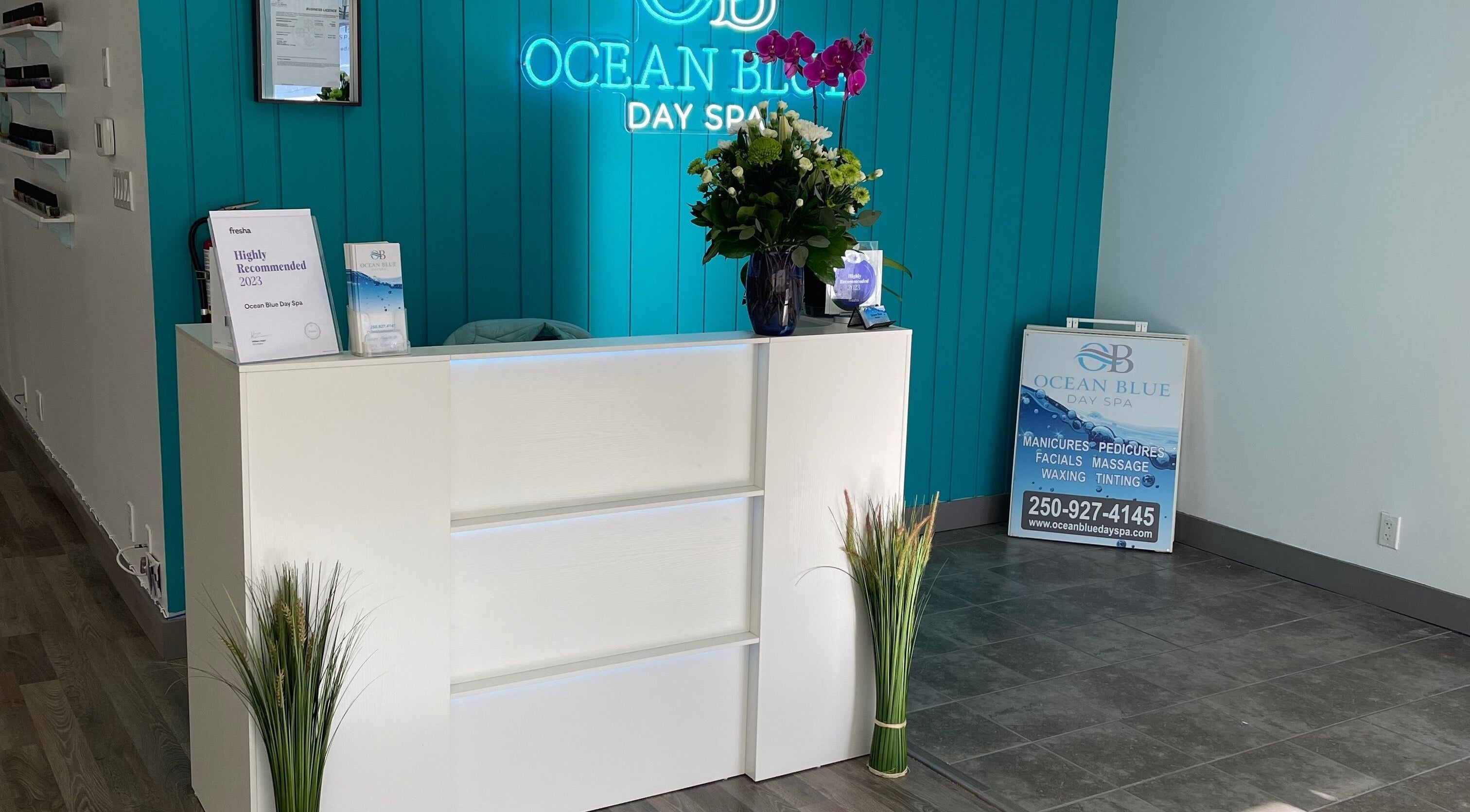 Reception area of Ocean Blue Day Spa in Port Alberni, British Columbia, featuring elegant decor.