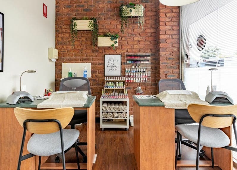 Nature's Beauty Secrets spa interior features cozy nail stations in Melbourne, Victoria, AU.
