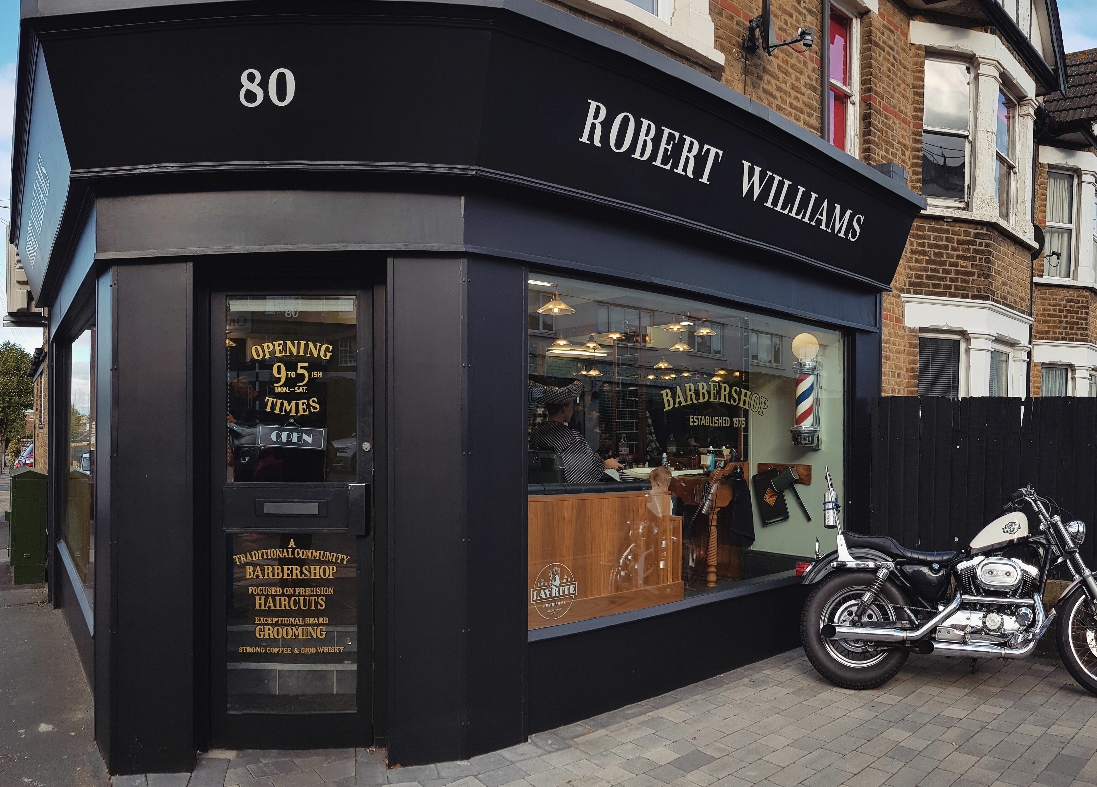 Exterior of Robert Williams Barbershop, Southend-on-Sea, England, showcasing classic charm.