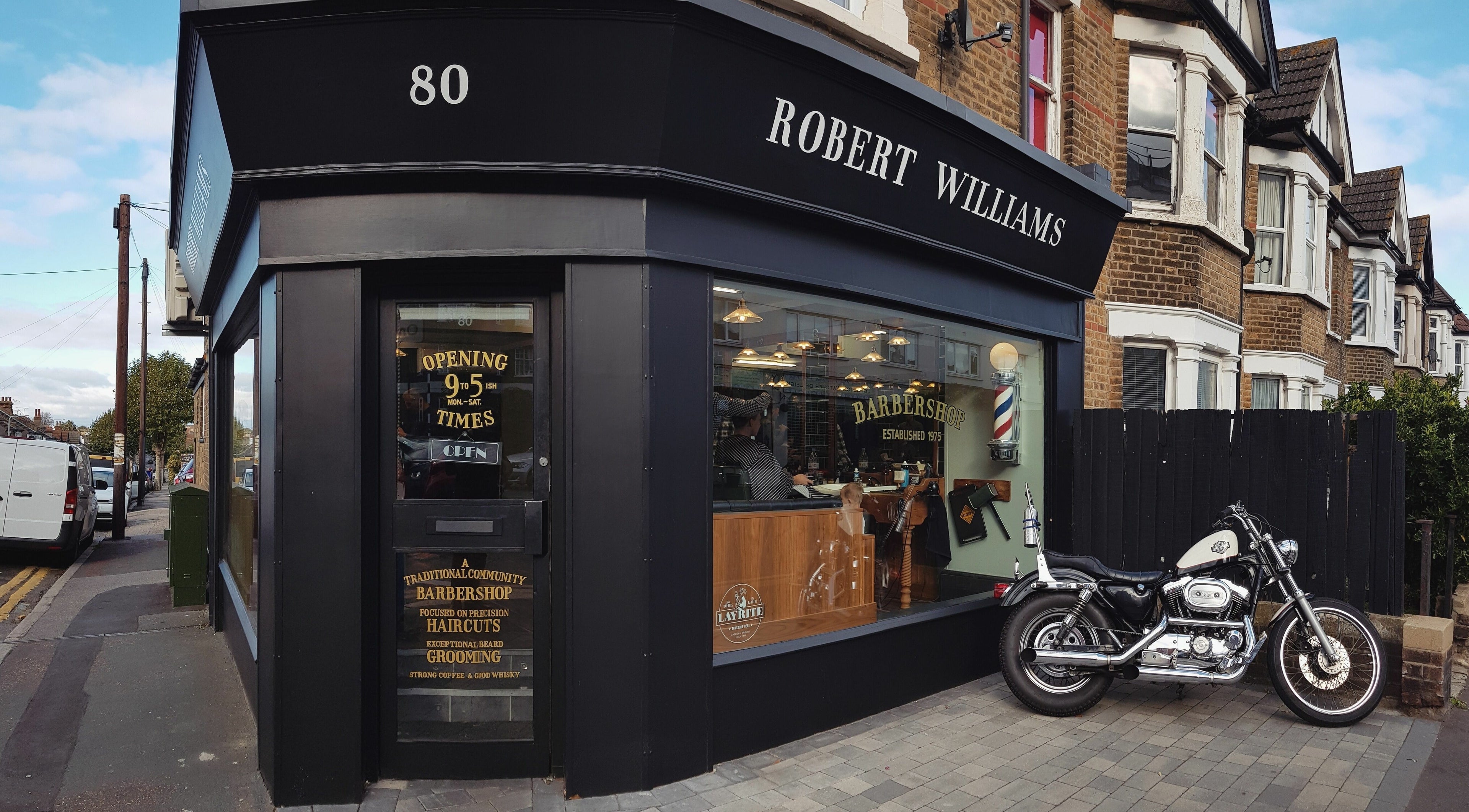 Exterior of Robert Williams Barbershop, Southend-on-Sea, England, showcasing classic charm.