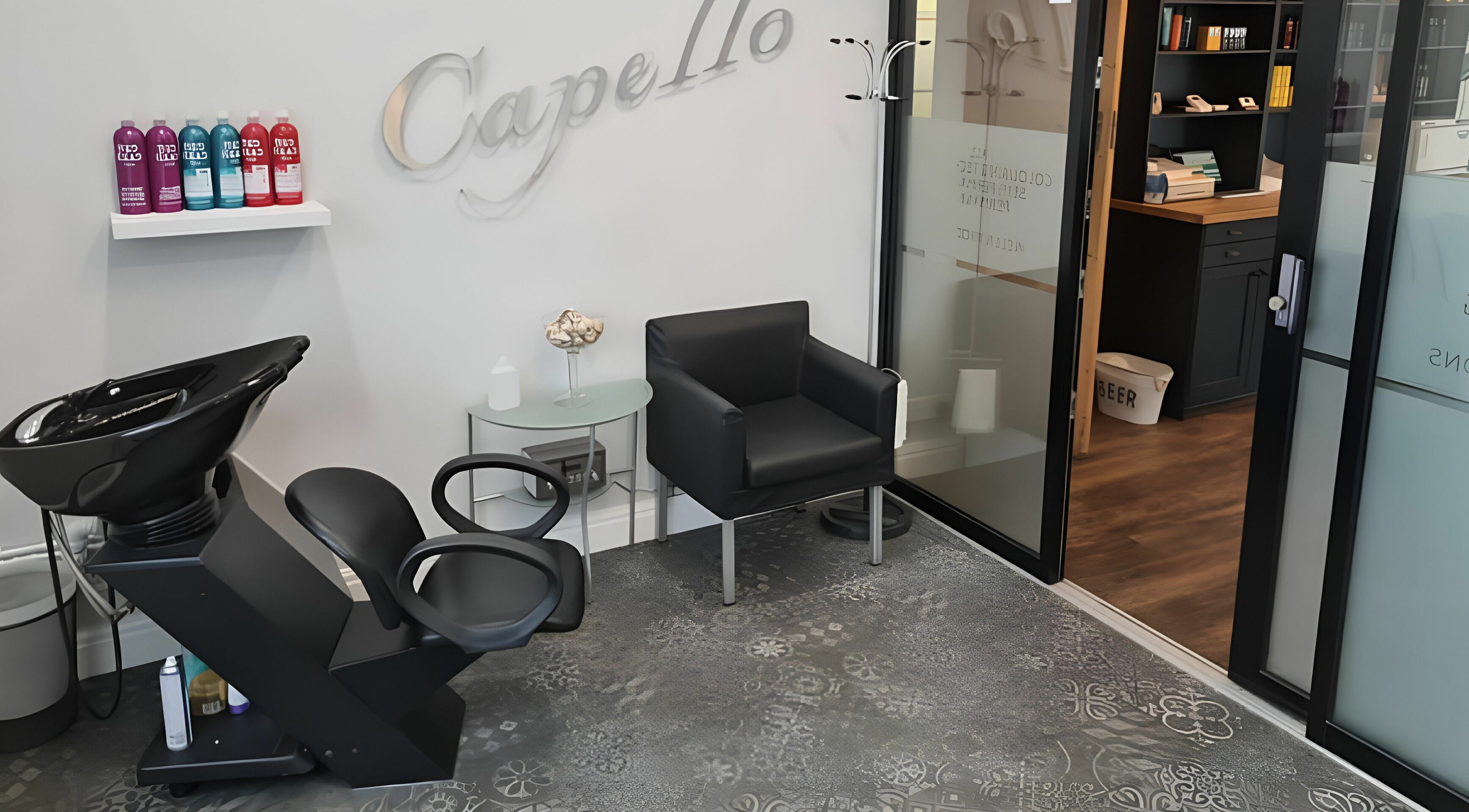 Modern hair wash area at Mr Snips Heswall, offering comfort and style in Heswall, England, GB.