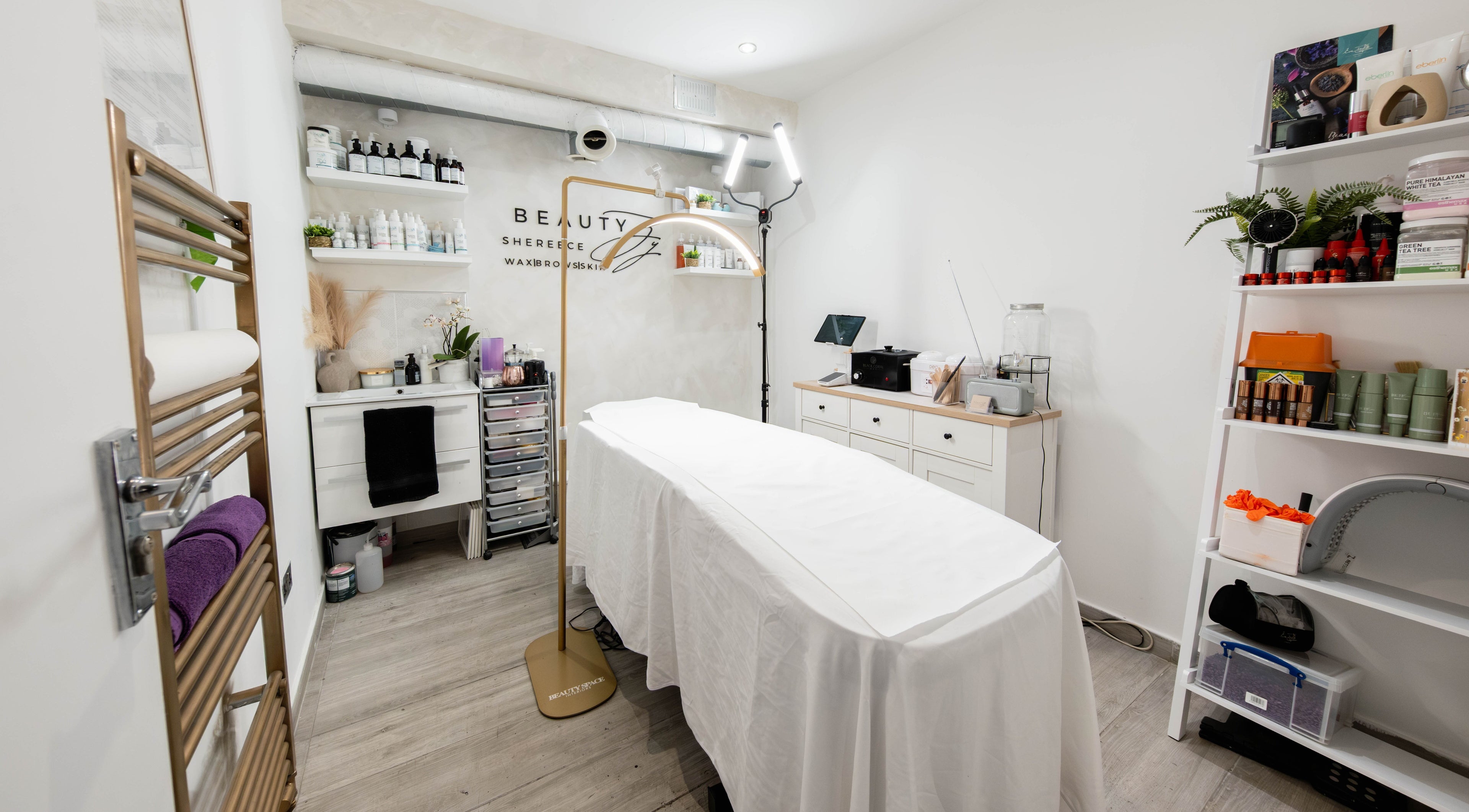 Elegant treatment room at Beauty By Shereece, London, England, GB, showcasing a modern spa-like atmosphere.