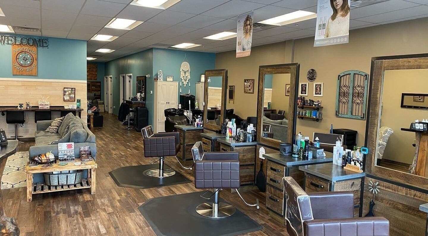 Modern salon interior at American Hair Barn, Derry, New Hampshire, US featuring chic styling stations.