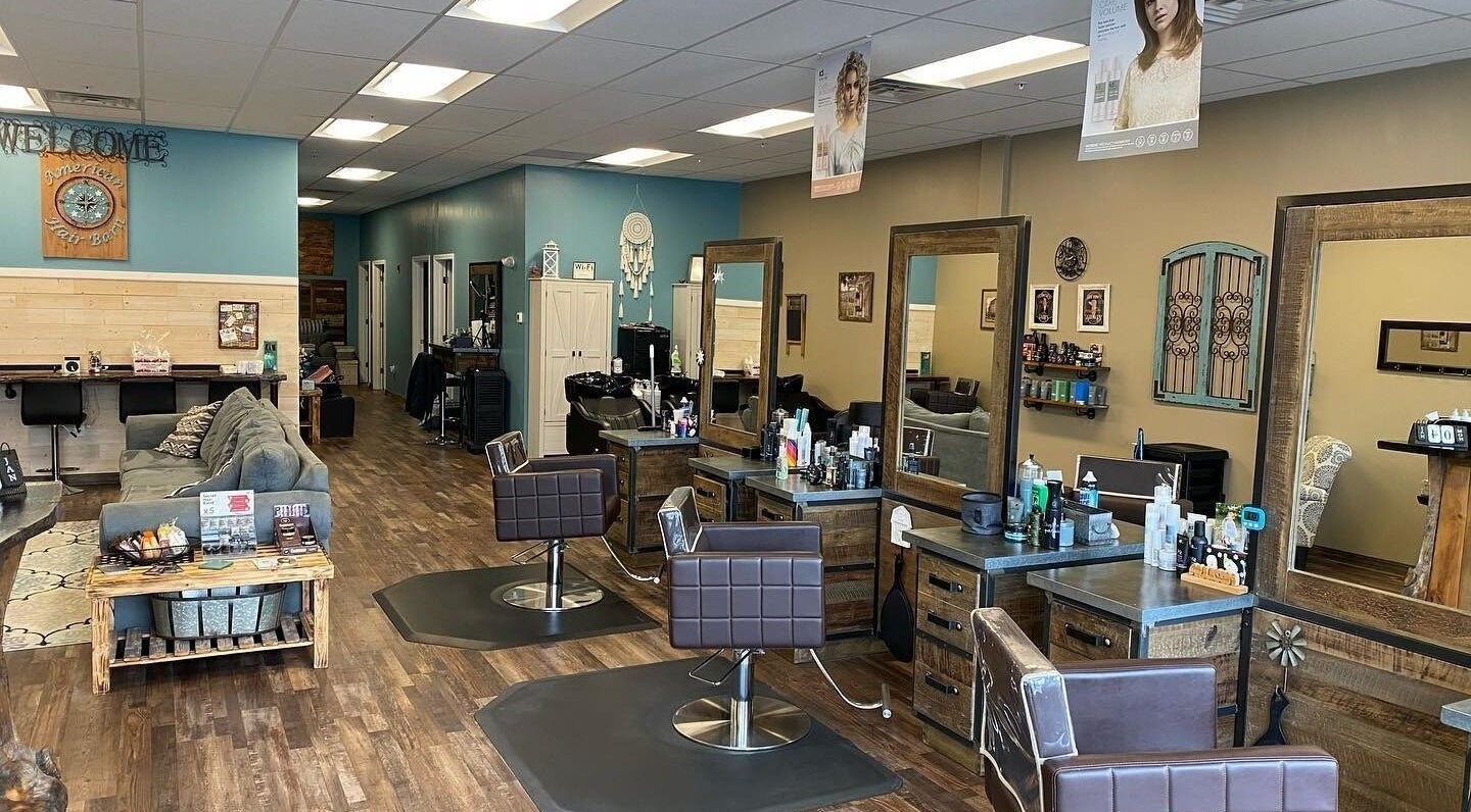 Modern salon interior at American Hair Barn, Derry, New Hampshire, US featuring chic styling stations.