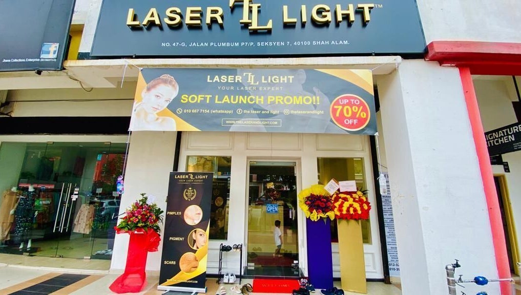 Front view of Laser Light Skin Centre Shah Alam, Selangor, MY with a soft launch promo banner.