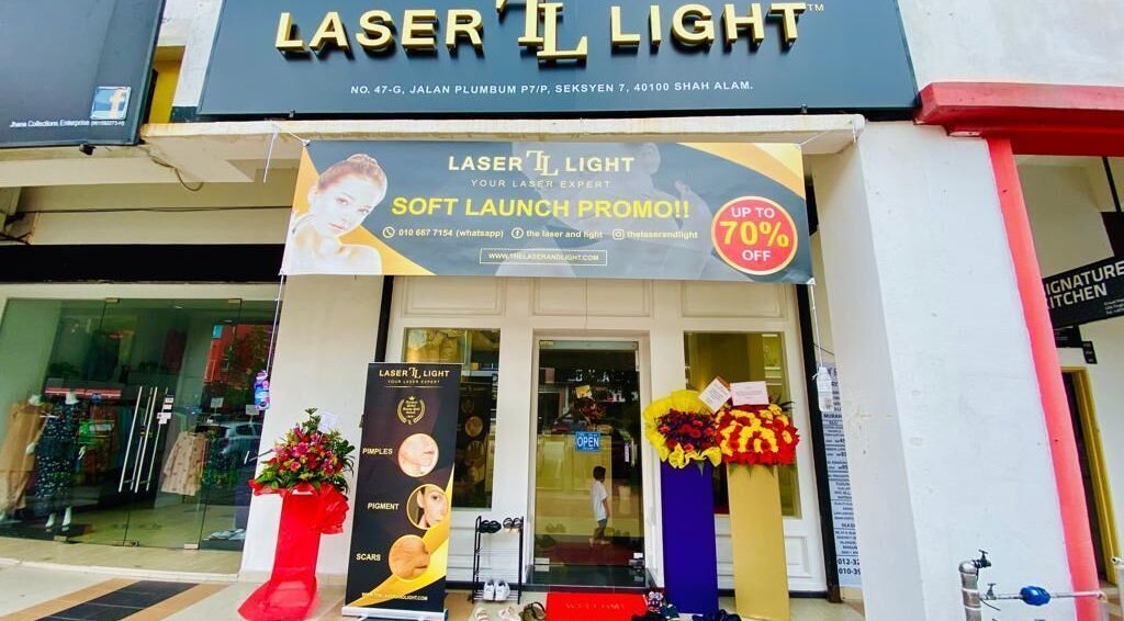 Front view of Laser Light Skin Centre Shah Alam, Selangor, MY with a soft launch promo banner.