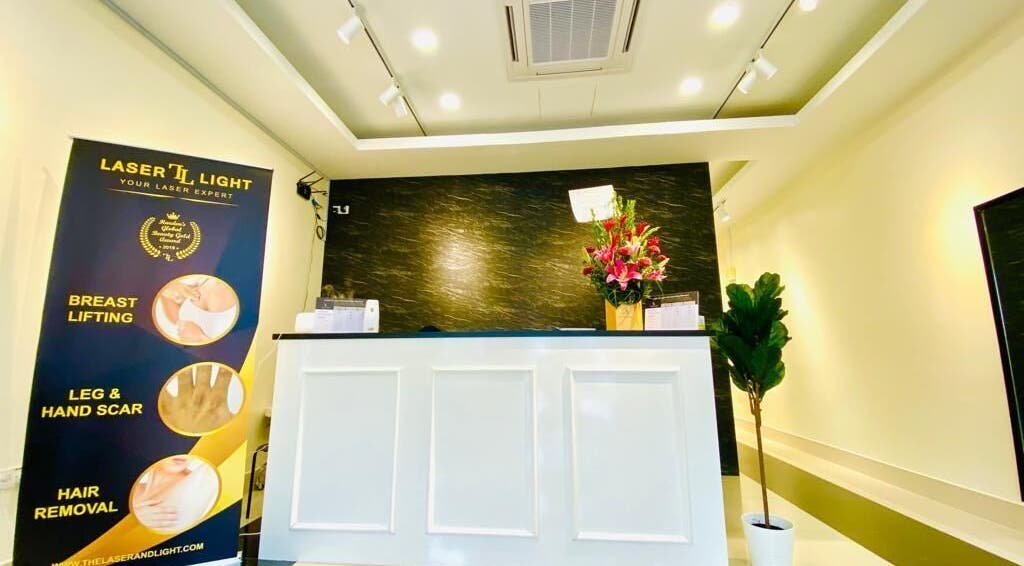 Reception area at Laser Light Skin Centre Shah Alam with floral decor, Shah Alam, Selangor, MY.
