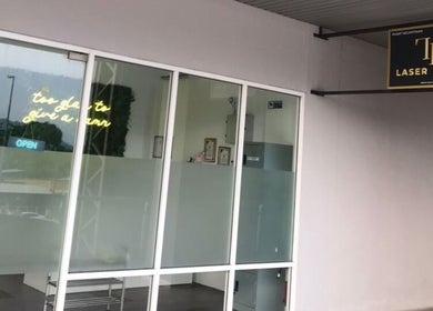 Entrance of Laser Light Skin Centre in Seberang Perai, Pulau Pinang, MY, showcasing modern glass doors.