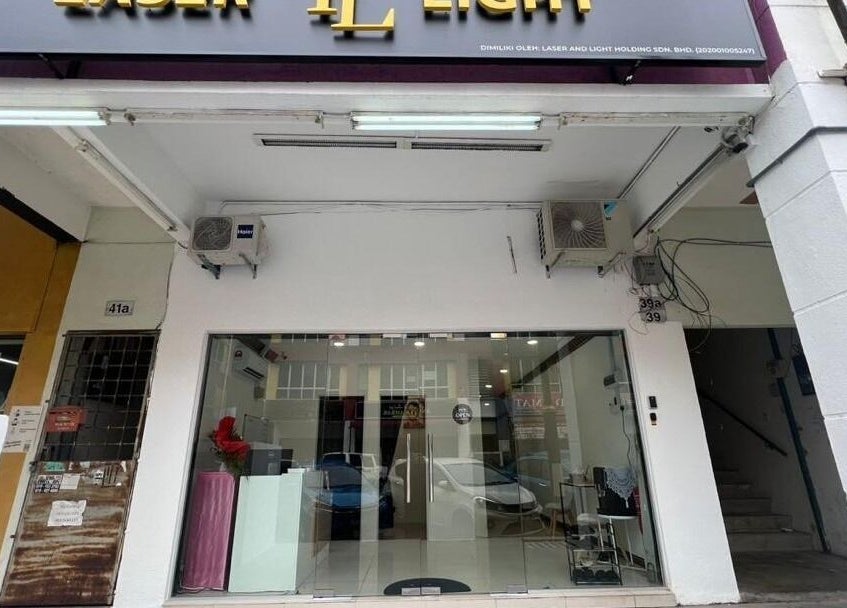 Front view of Laser Light Skin Centre in Kuantan, Pahang, MY. Showcases modern glass entrance.