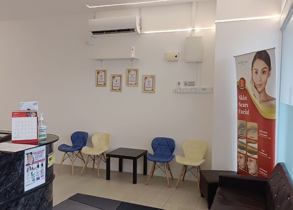 Cozy reception area at Laser Light Skin Centre Johor Bahru, Johor, MY. Modern decor with seating and display.