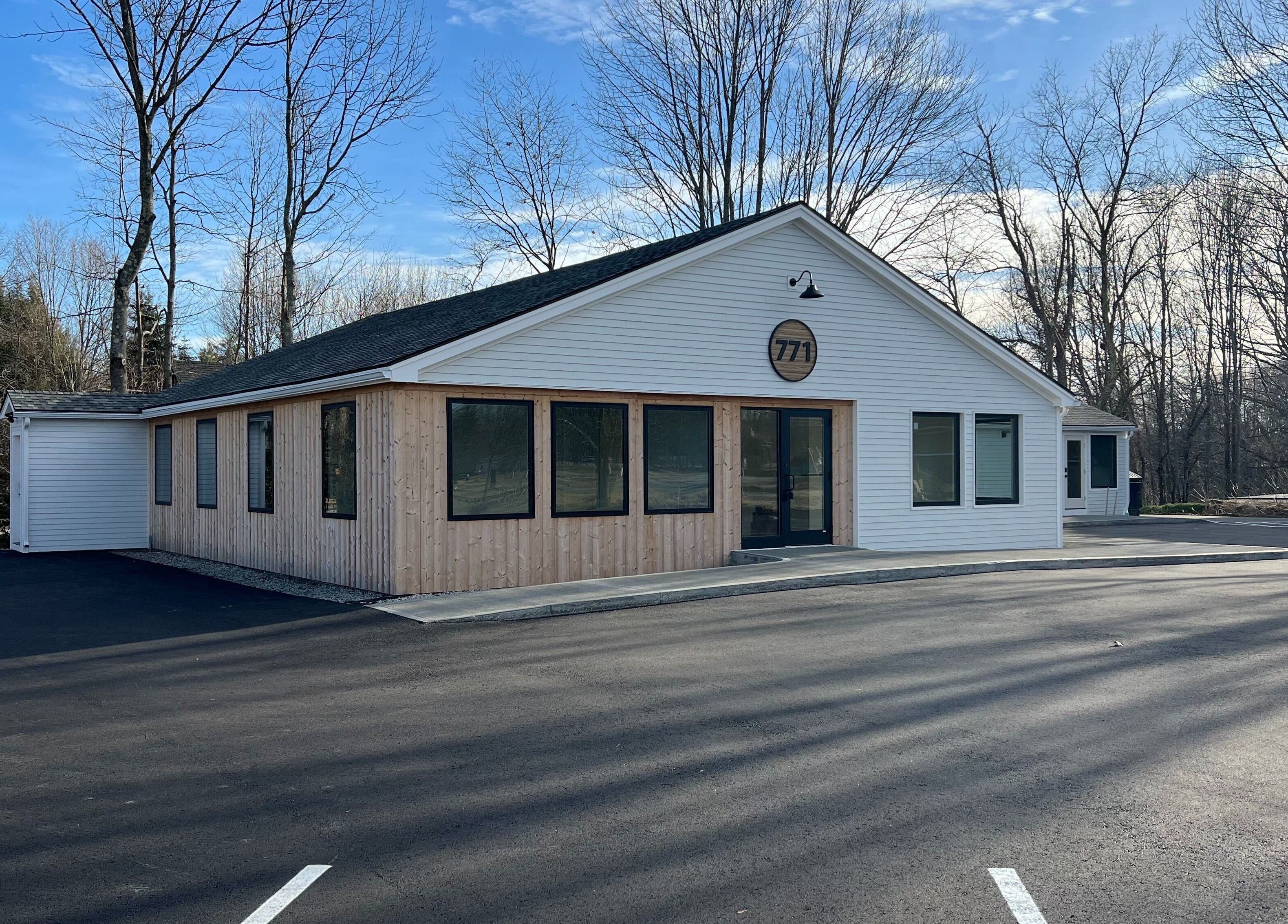 771 Beaute’ Bar facade highlighting its sleek design in Buxton, Maine, US.