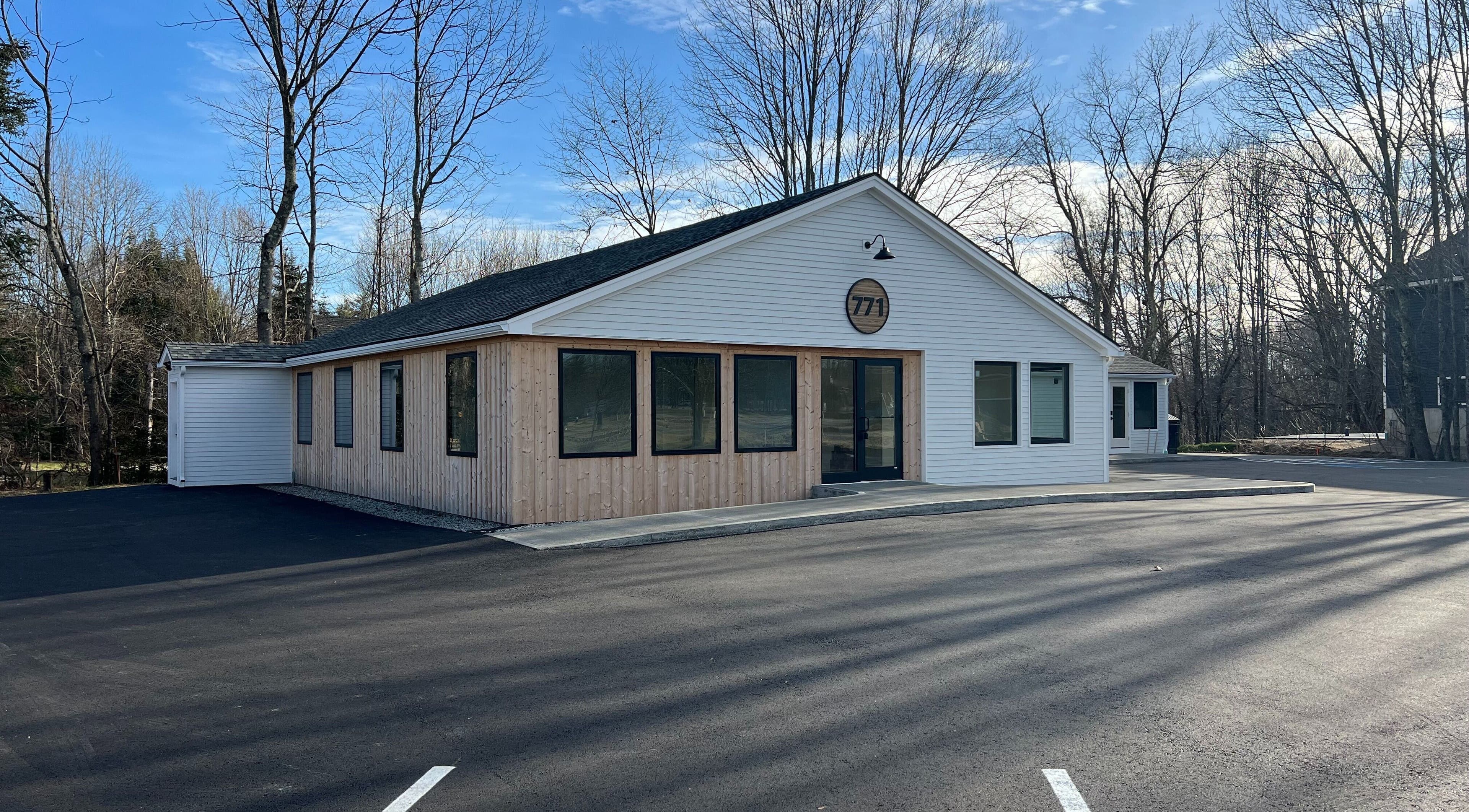 771 Beaute’ Bar facade highlighting its sleek design in Buxton, Maine, US.
