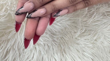 Stylish red and black patterned nails at Blushed On! Nails&Beauty Verulam, Verulam, KwaZulu-Natal, ZA.