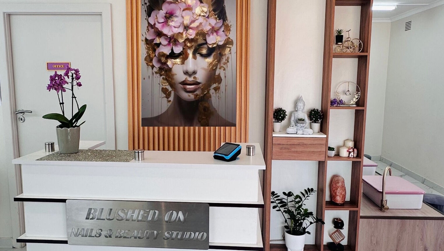 Reception area of Blushed On! Nails&Beauty Verulam in Verulam, KwaZulu-Natal, ZA with stylish decor.