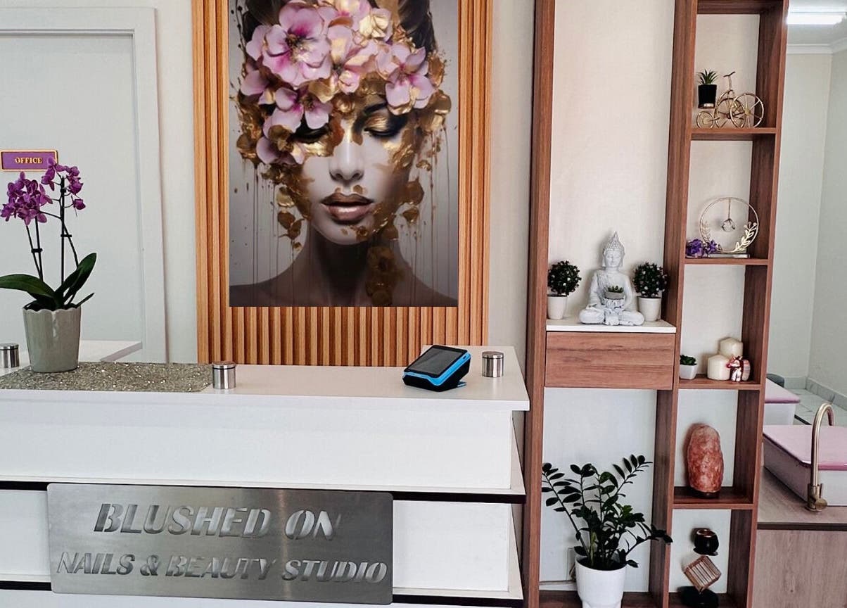 Reception area of Blushed On! Nails&Beauty Verulam in Verulam, KwaZulu-Natal, ZA with stylish decor.