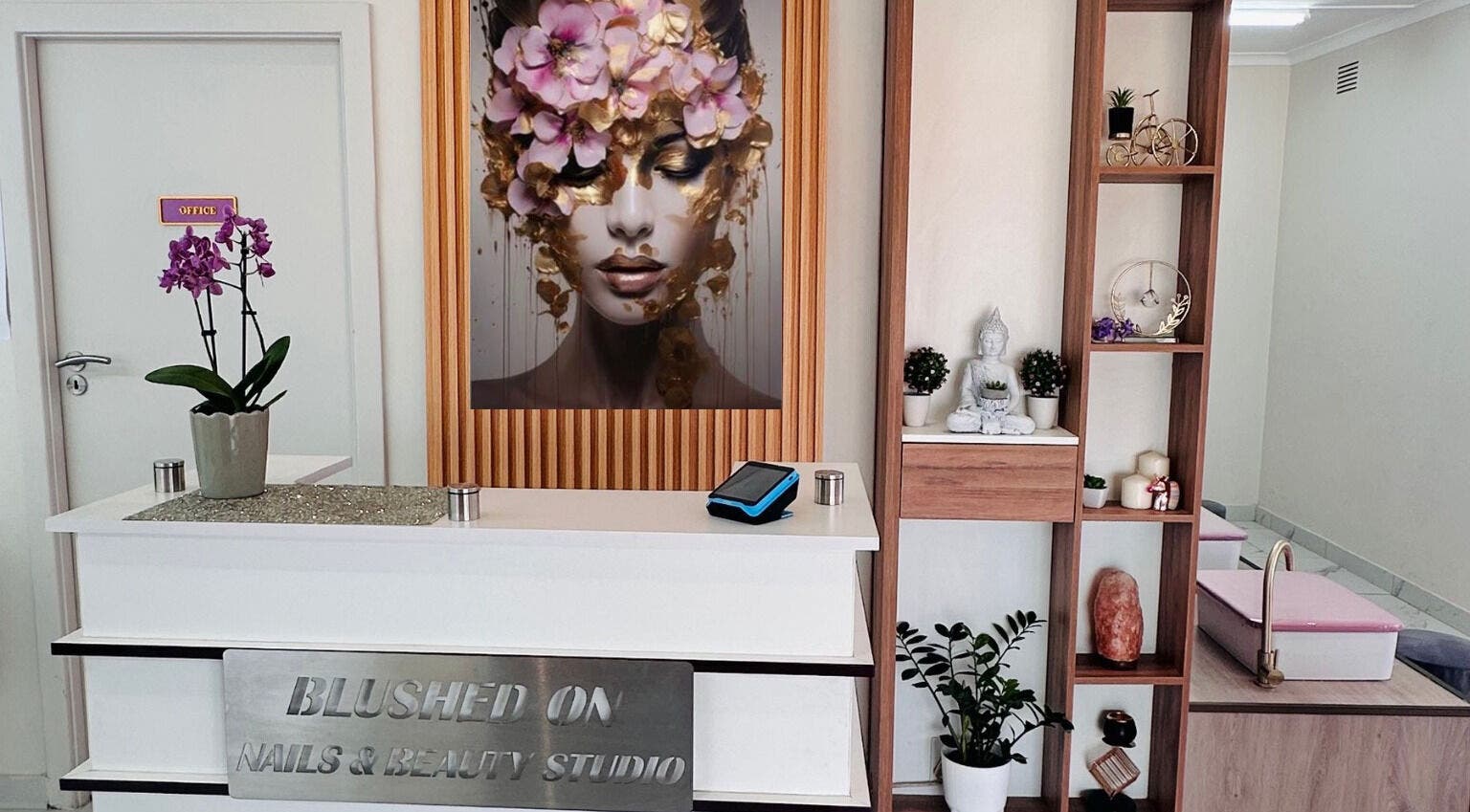Reception area of Blushed On! Nails&Beauty Verulam in Verulam, KwaZulu-Natal, ZA with stylish decor.