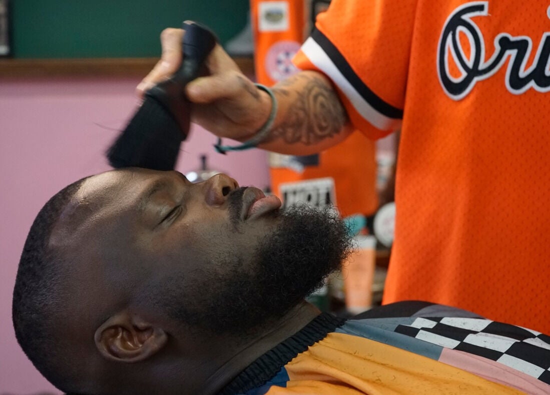 Customer enjoys grooming at Lost N Found Barbers, Albury, New South Wales, AU.