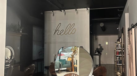 Inviting interior of Studio29 in Edmonton, Alberta, CA with seating and decor that says 'hello'.