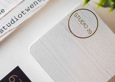 Studio29 branding on wood decor at Edmonton, Alberta, CA, showcasing elegant design elements.